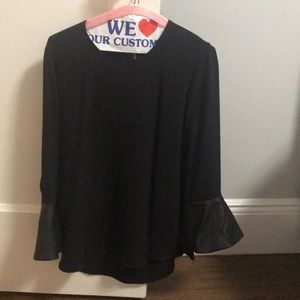 Black top with leather cuff